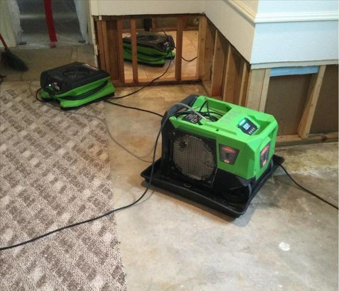 Drying equipment and flood cuts in a home.