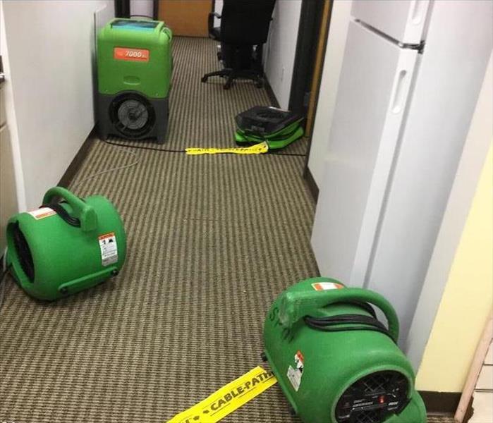 SERVPRO equipment at work in office building