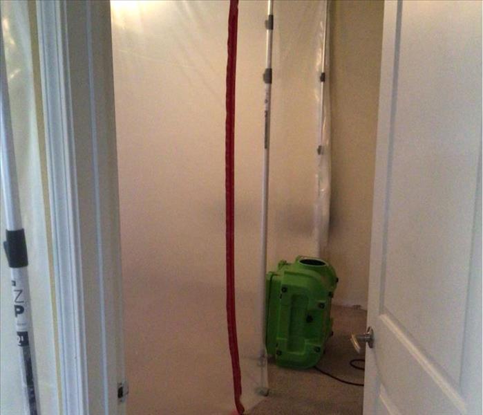 Mold containment in a bedroom.